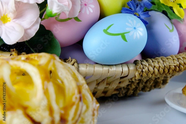 Fototapeta Bakery with colorful Easter Eggs in the basket celebrate Easter Day Festival backgrounds promotional materials design idea copy space stock photo