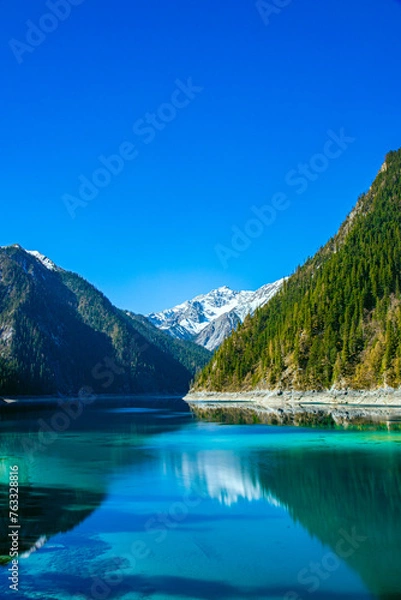 Fototapeta Jiuzhaigou Valley, Aba Qiang and Tibetan Autonomous Prefecture, Sichuan Province - beautiful lakes and mountains under the blue sky