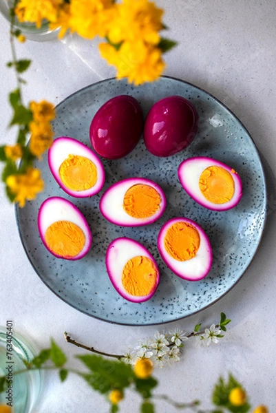 Fototapeta Hard boiled eggs pickled in beetroot juice