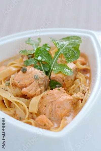 Obraz Salmon spaghetti with orange sauce