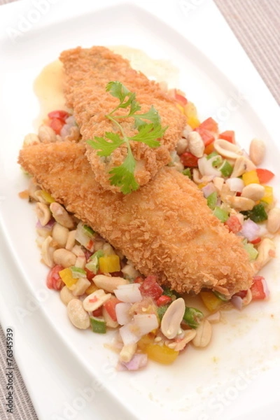 Obraz Fried fish with herb salad