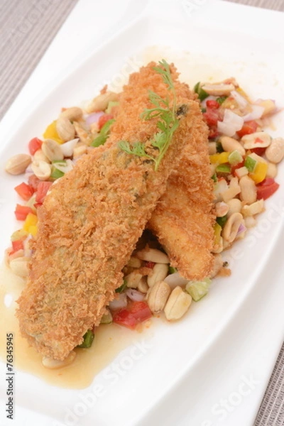 Obraz Fried fish with herb salad
