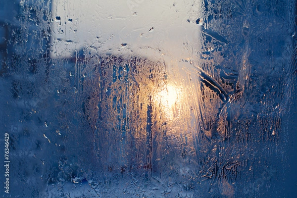 Fototapeta Ice patterns on winter glass.