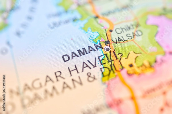 Fototapeta Daman on a map of India with blur effect.