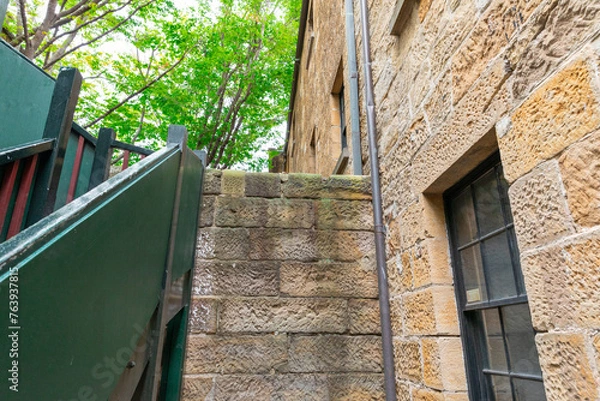 Fototapeta Sydney Rocks precinct on the shore of Sydney Harbour historical architecture from the first fleet settlement over 200 years ago. Buildings made from sandstone blocks small narrow streets NSW Australia