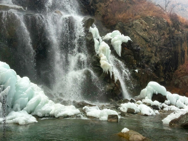 Fototapeta Drung Waterfall - An Amazing Frozen Waterfall located at Tangmarg, Gulmarg, Kashmir, India