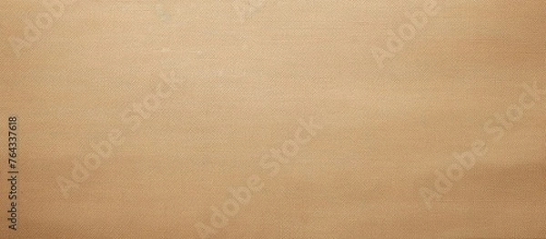 Fototapeta A detailed view capturing the texture of brown paper illuminated by a gentle light