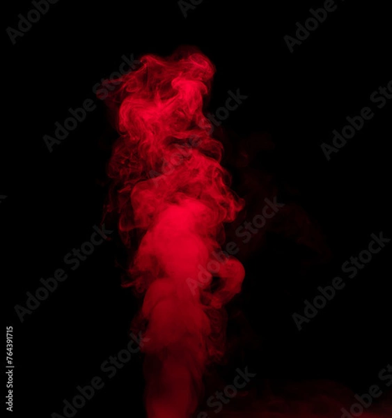 Fototapeta Abstract background of chaotically mixing puffs of red smoke on a dark background