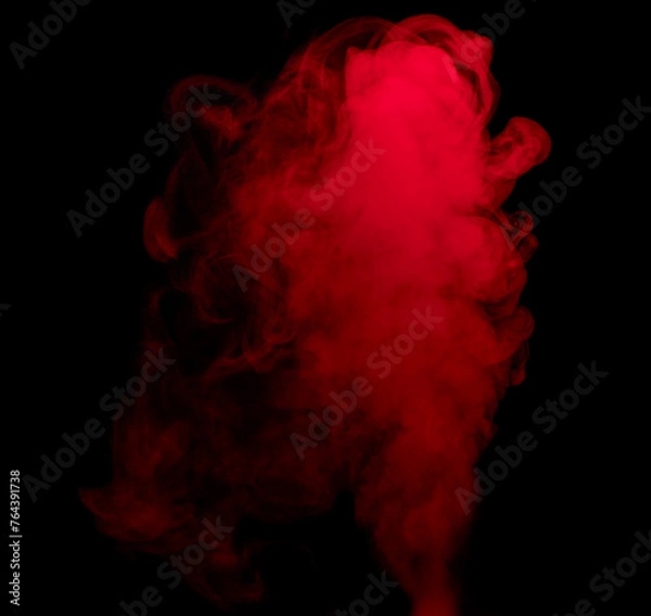 Fototapeta Abstract background of chaotically mixing puffs of red smoke on a dark background