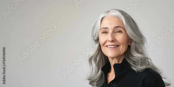 Obraz beautiful smiling elderly woman with gray hair on white background, lady, grandmother, old age, wrinkles, person, portrait, face, wrinkles, studio photo, skin care