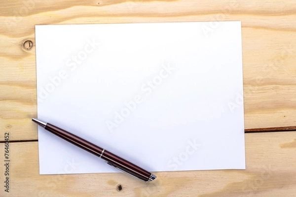 Obraz pen over white paper page