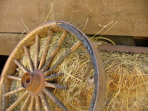 Fototapeta broken stagecoach wheel, landscape view (offset)
