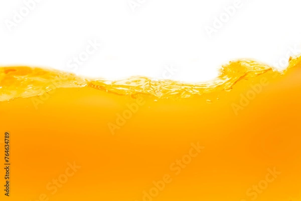 Fototapeta Close up bright orange juice texture for health and nature waves