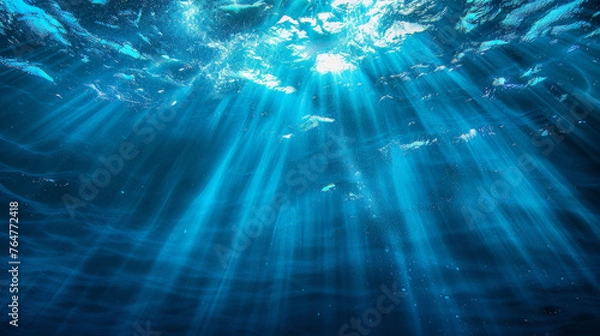 Fototapeta Aquatic Elegance: Deep Sea Light Rays Filtering Through Ocean Water