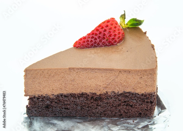 Fototapeta piece of chocolate cake of two layers with fresh strawberries on
