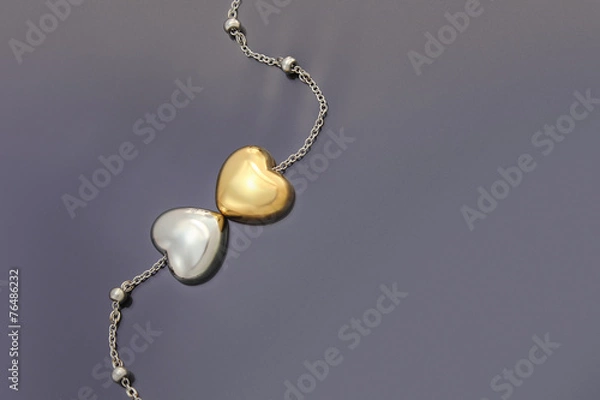 Fototapeta Gold and Silver Heart necklace