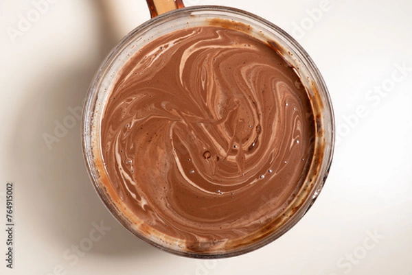 Fototapeta Making sauce with melting chocolate and thickened cream. Cooking Salted Caramel Chocolate Cold Cake Series.
