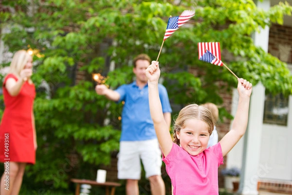 Obraz Summer: Girl In Front Yard with American Flags