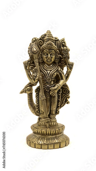 Fototapeta statue of hindu god of war subramanya, son of lord shiva with his animal, a peacock isolated in a white background
