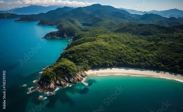 Fototapeta An aerial view of the beach and junglecovered mountains surrounding Chilbo,andsulphuriclandscape in summer with clear blue water
