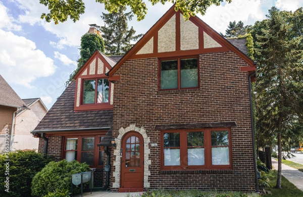 Fototapeta brick house with trees