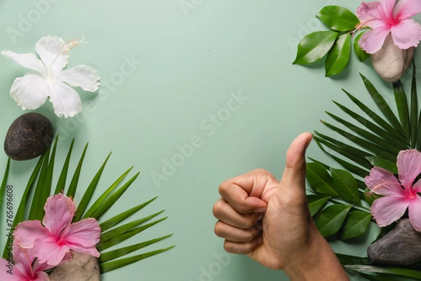 Fototapeta Man's hands on a green background ecological concept