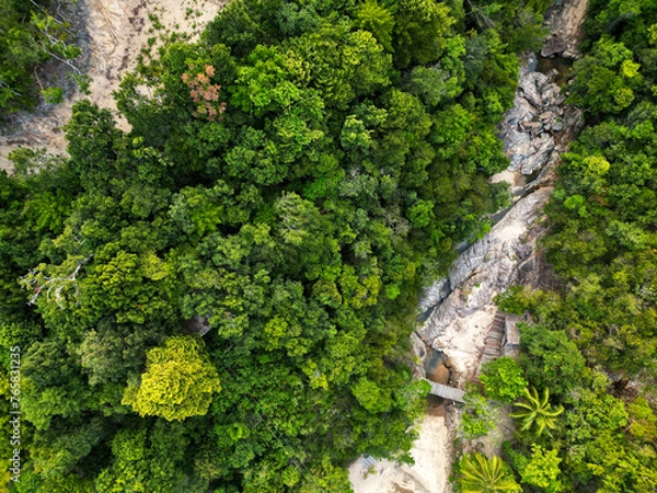 Obraz Aerial drone view small Koh Ma island, Ko Phangan Thailand. Exotic coast panoramic landscape, Mae Haad beach, summer day. Sandy path between corals. Vivid seascape, mountain coconut palms from above.