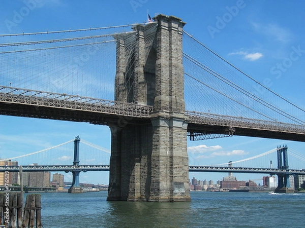 Fototapeta landscape view of brooklyn bridge tower, manhattan