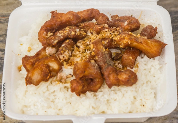 Fototapeta Garlic fried squid egg on rice