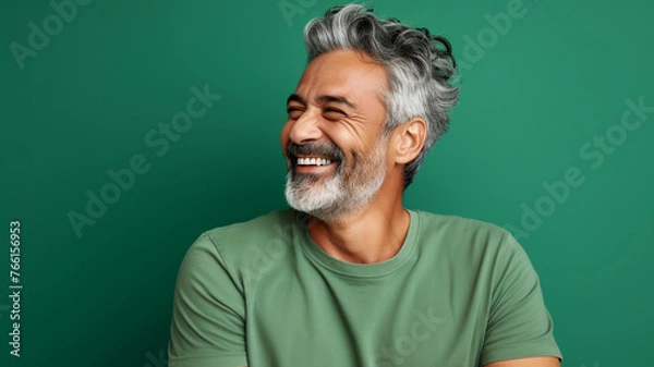Obraz Happy smiling middle aged adult man on a solid background