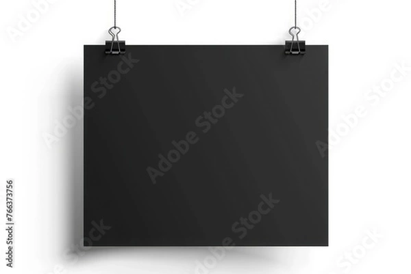 Fototapeta Realistic black hanging blank paper sheet with shadow in A4 format and paper clip, binder on white background. Design poster, template or mockup. Vector illustration.
