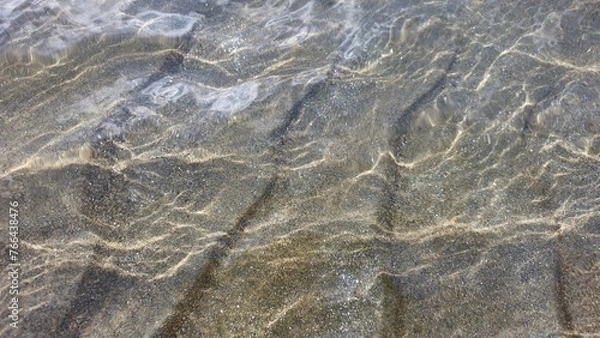 Obraz Water waves with sand bottom