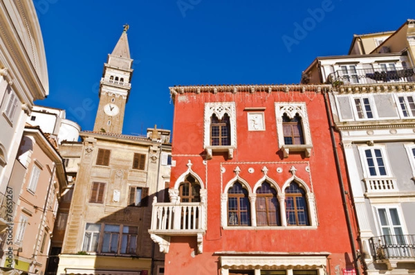 Fototapeta Bell tower and buildings at Tartini square in Piran, Istria
