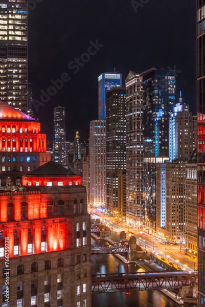 Fototapeta Chicago Downtown. Cityscape image of Chicago, Ill. USA during twilight blue hour showing high rises, river, and river walk in the downtown district.