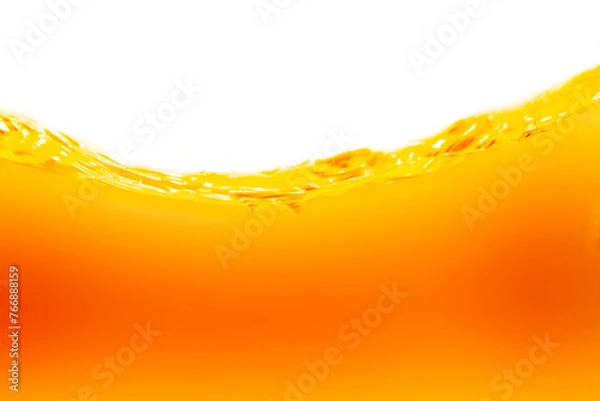 Fototapeta Close up bright orange juice texture for health and nature waves