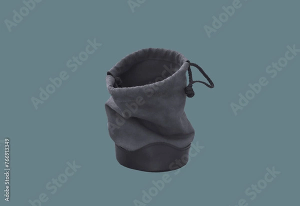 Obraz Leather container for lens storage.