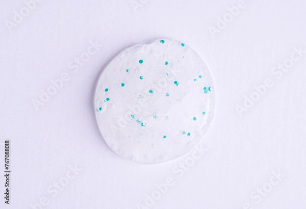 Obraz Cosmetic texture, cleanser foam, shower gel close-up on a white background. Peeling swatch. Samples of natural cosmetics, top view.
