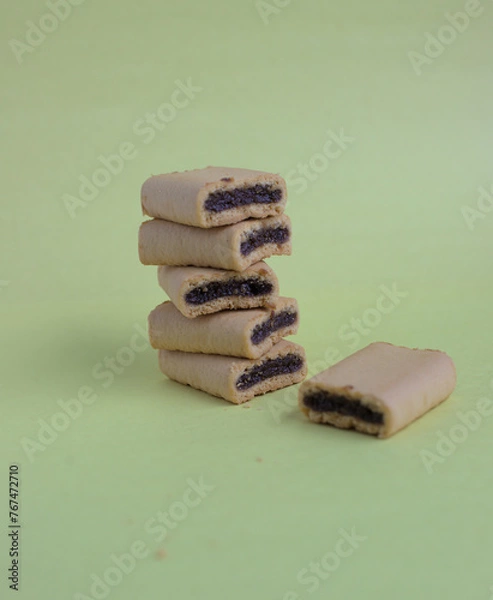 Obraz Figs bites on a yellow background