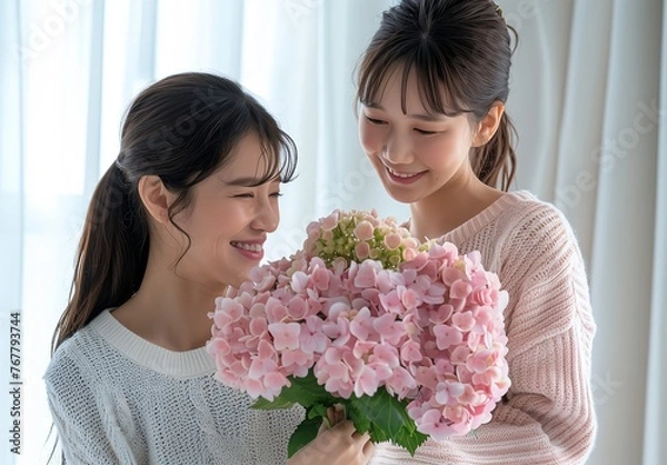 Fototapeta 母の日に花束を渡す女性