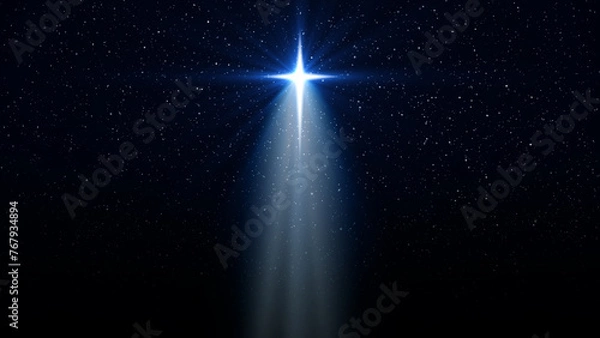 Fototapeta Christmas star of the Nativity of Bethlehem, Nativity of Jesus Christ with rays of light. Background starry sky and bright star