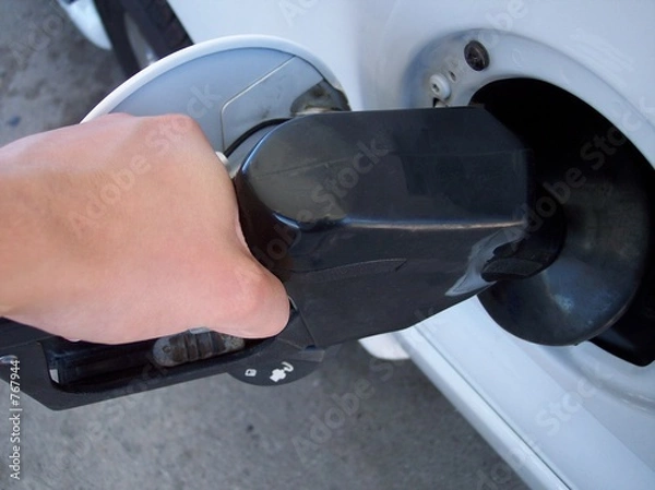 Obraz gas up at the fuel pump
