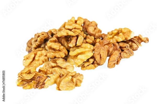 Fototapeta Handful of walnuts isolated on white background.