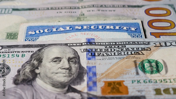 Fototapeta Photo of social security card with one hundred dollar bills
