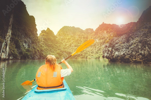 Obraz Towards to adventures in a kayak in the picturesque Halong Bay