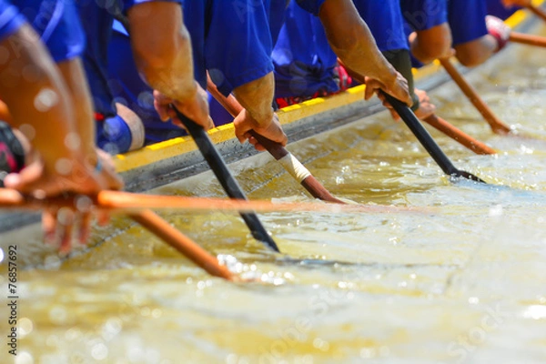 Fototapeta teamwork of rowing team