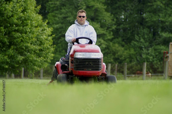 Fototapeta mowing the lawn