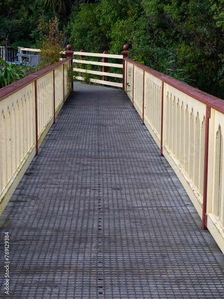 Fototapeta Walkway With Fence Either Side