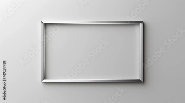 Fototapeta Brushed silver rectangle frame, sleek lines on a pure white backdrop