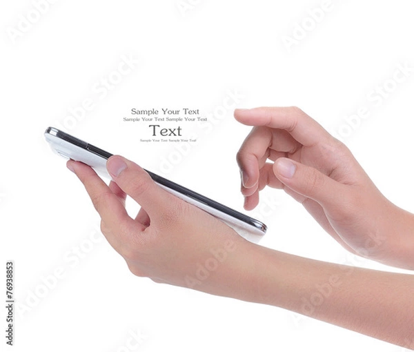 Fototapeta Hand holding and operating a smart phone isolated on white