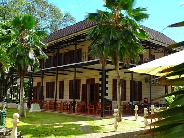 Fototapeta Seychelles, city of Victoria, National History Museum in the old courthouse and the statue of the intendant Pierre Poivre